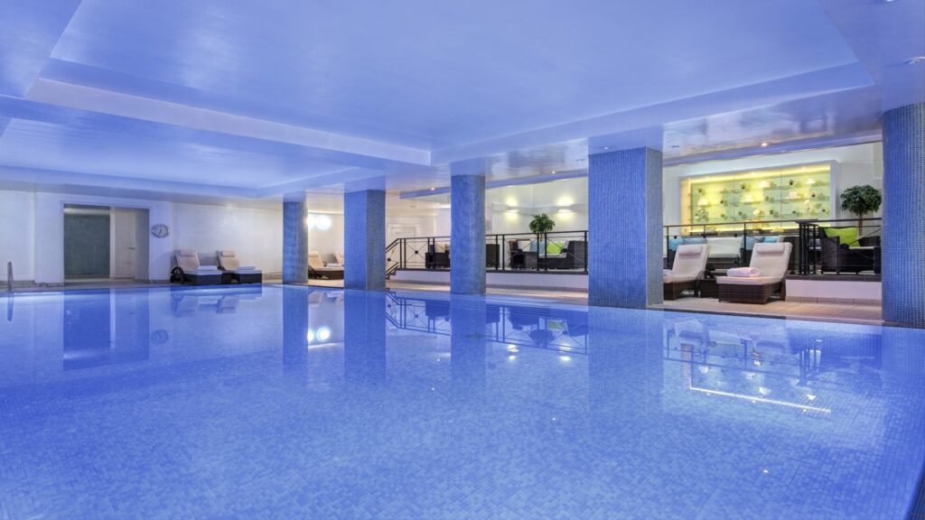 15 meter indoor heated swimming pool and thermal loungers at the Irene Forte Spa inside The Balmoral Hotel Edinburgh.