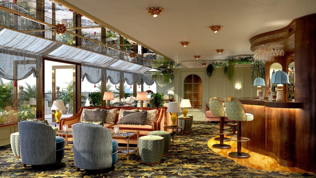 The outdoor terrace of Lamplighters rooftop bar at Gleneagles Townhouse, offering a scenic lounge area with views over the Edinburgh skyline.